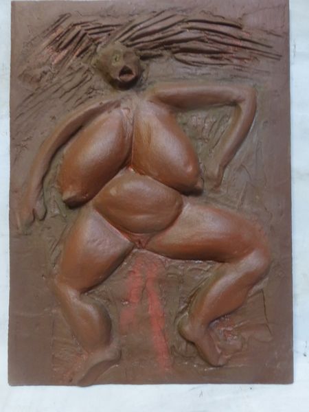 La Mère des masques - bas-relief © Clément